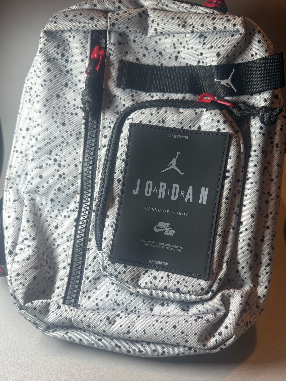 Jordan Speckled Sling Bag - White with Black and Red Accents - Picture 3 of 8